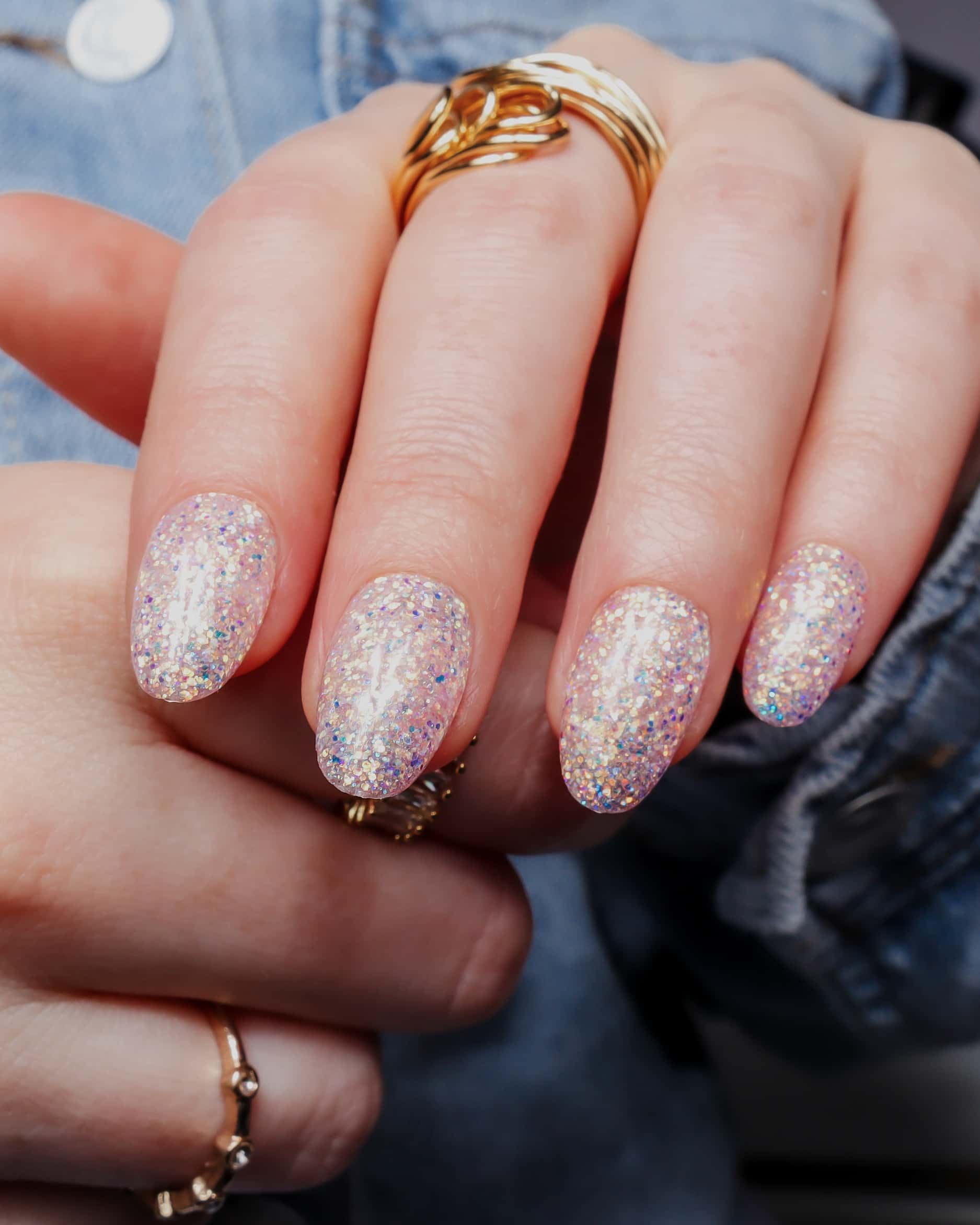 Glitter nails. Encapsulated glitter. Reusable nail extensions. 