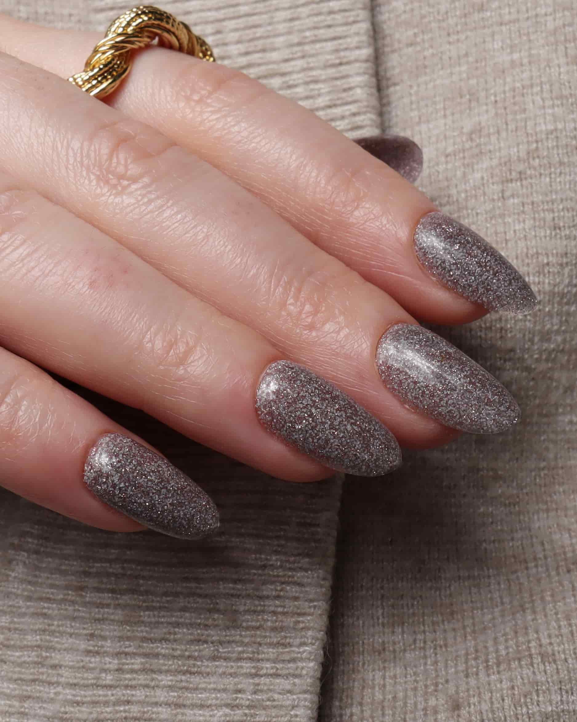 Glitter nails. Encapsulated glitter. Reusable nail extensions. 