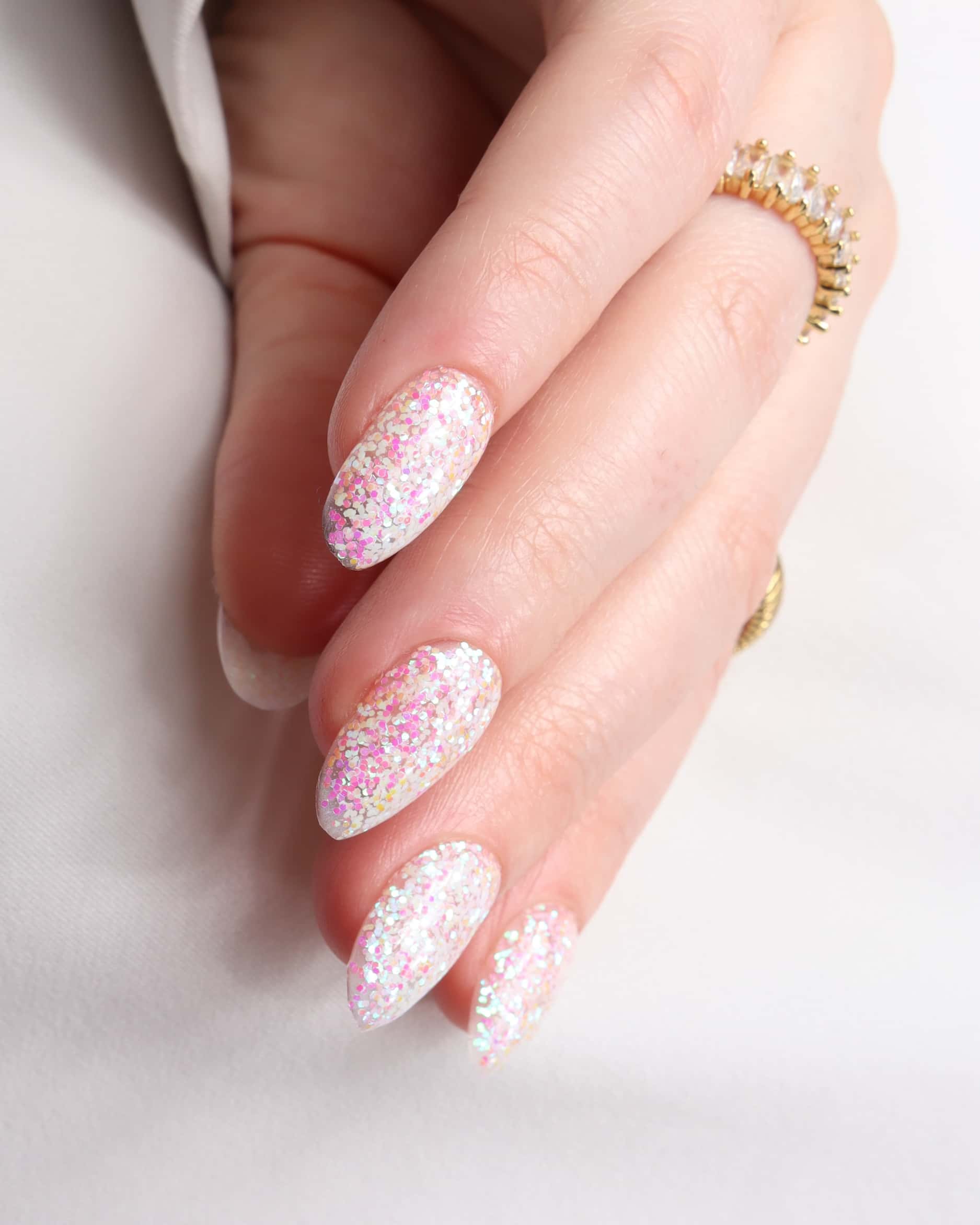 Glitter nails. Encapsulated glitter. Reusable nail extensions. 
