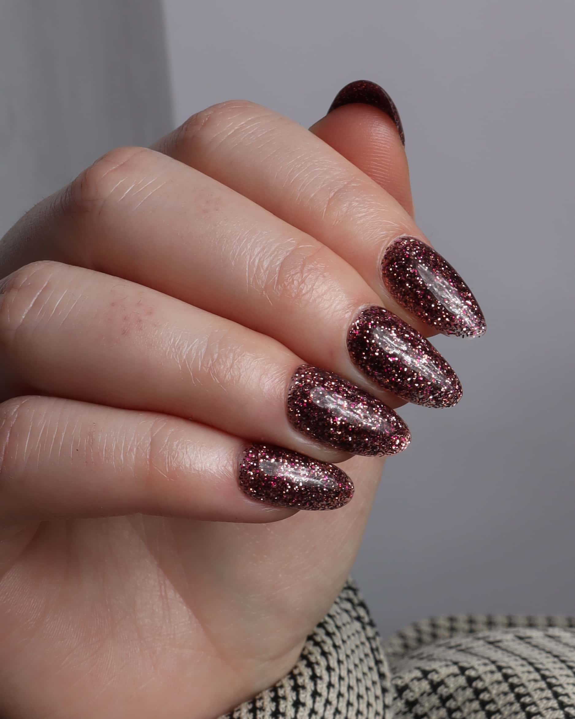 Glitter nails. Encapsulated glitter. Reusable nail extensions. 