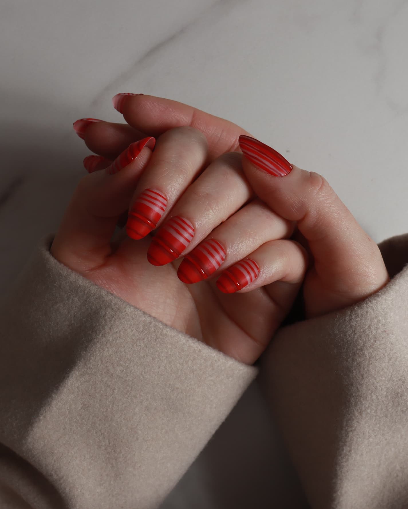 Striped Nails designed. Red striped nails. Fall nail extensions. Reusable nail extensions by Inglass Nails. 